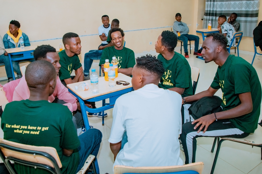 Gen Z comedians brainstorm before performing for their audience at IPRC Musanze.