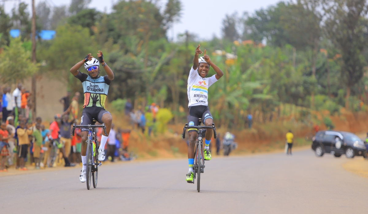 Eric Manizabayo (right) who rides for Benediction Ignite on Saturday clinched the second edition of the Kibugabuga cycling race. / Courtesy