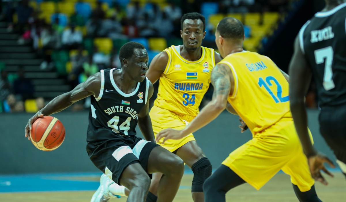 A South Sudan player tries to go past Rwandan players in a past game at the BK Arena. / Photo: Dan Nsengiyumva