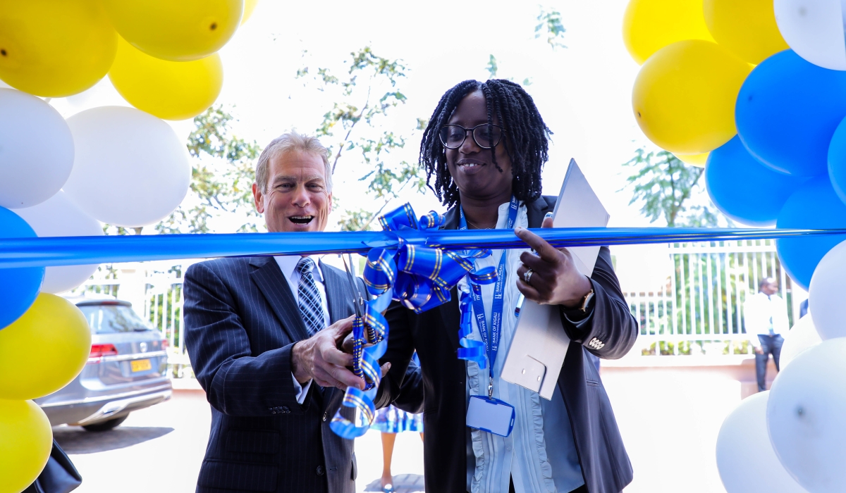 Rod M. Reynolds Chairperson of Bank of Kigali, Diane Karusisi Chief Executive Officer of BK cutting the ribbon during the launch of BK Academy on August 23, 2022. Dan Nsengiyumva