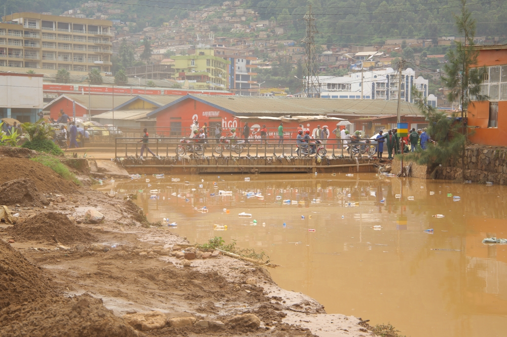A view of a polluted Mpazi drainage before the activities to upgrade the channel in 2019. RIB has launched operation to arrest environmental polluters suspects. / Craish Bahizi