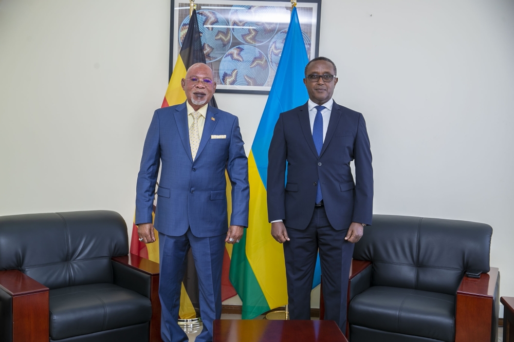 Uganda’s Minister for Foreign Affairs, Jeje Odongo, with his Rwandan counterpart, Vincent Biruta, at a bilateral meeting in Kigali on September 1. / Courtesy