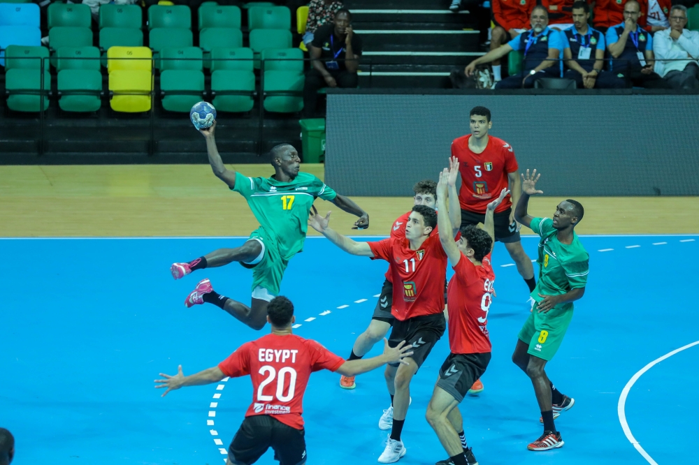 The U-18 national handball team during a game against Egypt.  They will face Algeria in the last game in Group B of the ongoing 2022 Africa Handball Confederation  Championship. Photo: Dan Nsengiyumva.