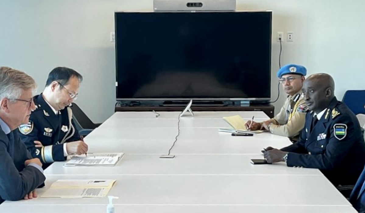 Amb. Claver Gatete, DIGP Felix Namuhoranye and the Under Secretary General during the meeting.