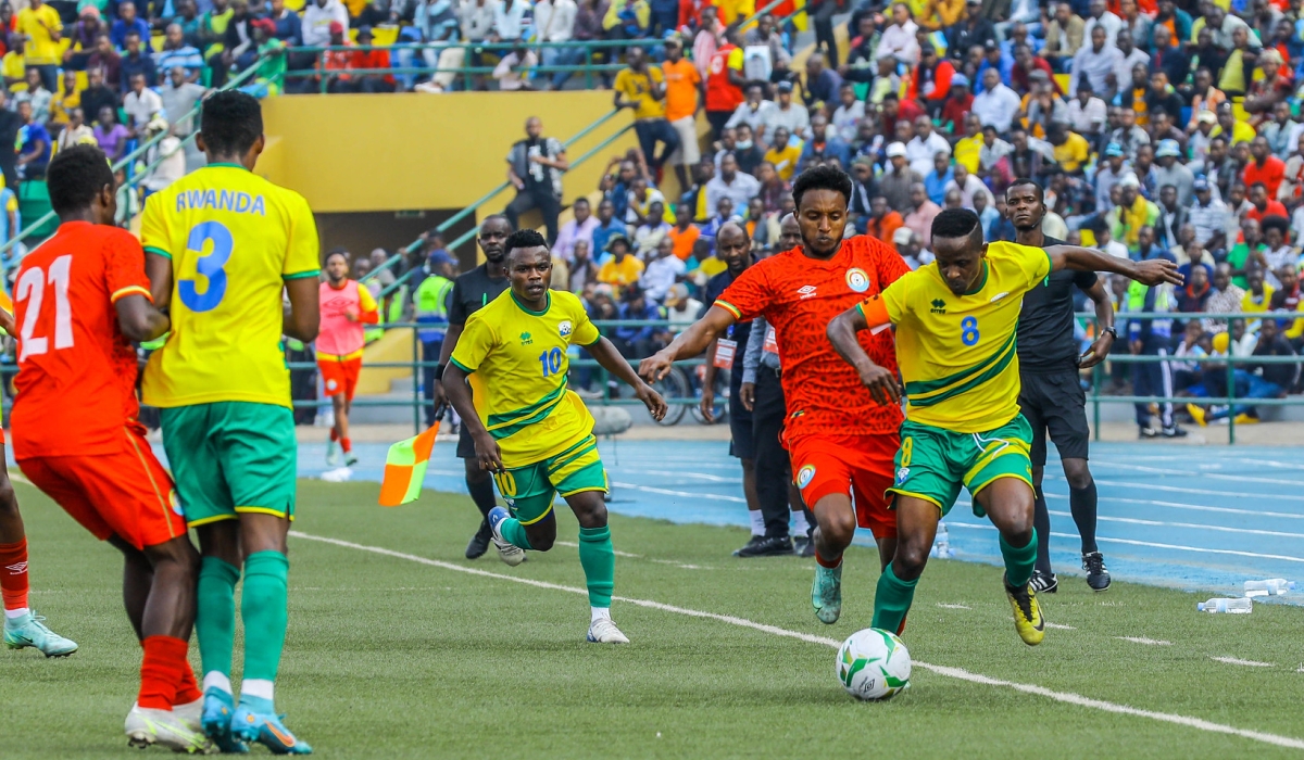 Amavubi captain Haruna Niyonzima dribbles past two Ethiopian defenders during the 2023 CHAN qualifier which Rwanda lost 1-0 and got eliminated.  The veteran midfielder was deployed on the wing despite not being as quick as he was in the past. / Photo: Dan Nsengiyumva