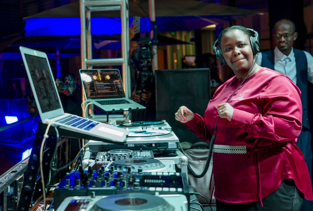 Clare Akamanzi, Chief Executive Officer of Rwanda Development Board ,nicknamed  DJ Visit Rwanda, tunes  the disc to entertain the audience during the 10th anniversary of Inkomoko in Kigali on September 3. All Photos by Olivier Mugwiza