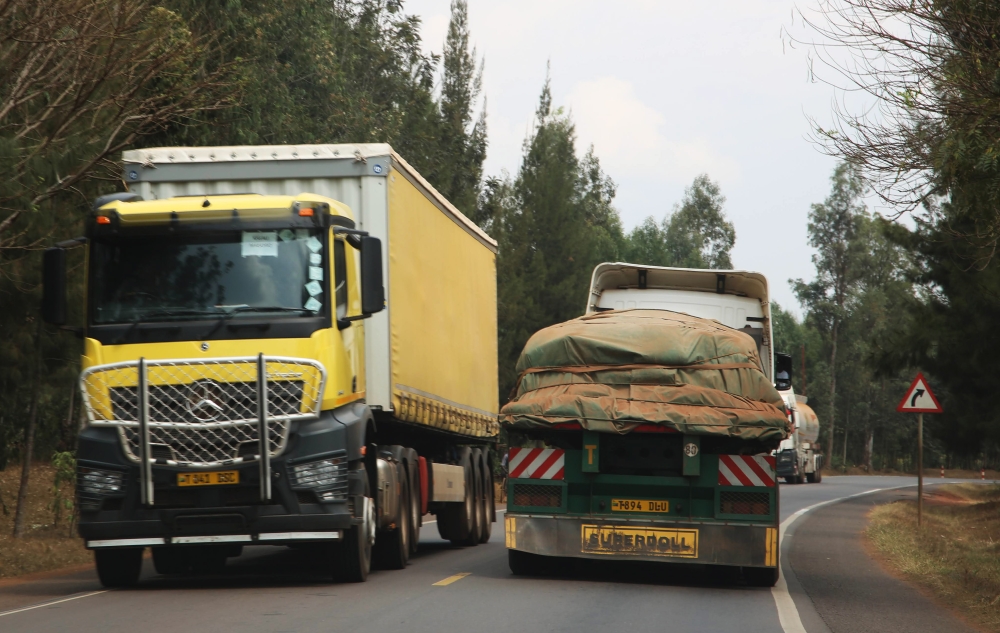 Cross border cargo trucks transport goods from Tanzania to Rwanda. Vehicles transporting goods with gross weight exceeding five tonnes but not exceeding 20 tonnes will pay an import duty rate of 10 per cent instead of 25 per cent. Photo: Craish Bahizi.