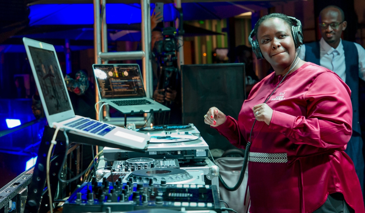 Clare Akamanzi, Chief Executive Officer of Rwanda Development Board ,nicknamed  DJ Visit Rwanda, tunes  the disc to entertain the audience during the 10th anniversary of Inkomoko in Kigali on September 3. All Photos by Olivier Mugwiza