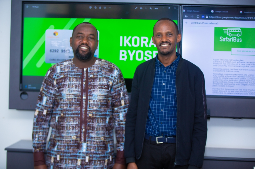 L-R: Willy Claude Karasira, CEO Centrika Ltd & Alex Ntale, CEO Rwanda ICT Chamber. (Craish Bahizi)