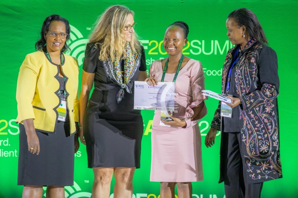 Liliane Uwintwari, the CEO of Mahwi Tech,receives Agric award after boosting farmer incomes or something shorter in Kigali on September 7.Courtesy
