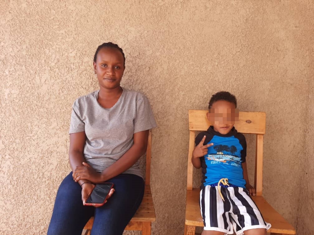 Adeline Niyitanga with her child in Gatsata Sector, Gasabo District. Photo: Alice Kagina.