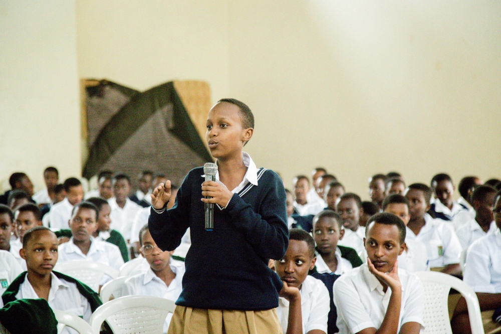 A student asks a question during a meeting with school leaders at  Lycée  de Kigali. The government is set to hand over Lycée de Kigali, one of the most prominent traditional secondary schools in the country, to Catholic brothers of the Marist order, Dan Nsengiyumva