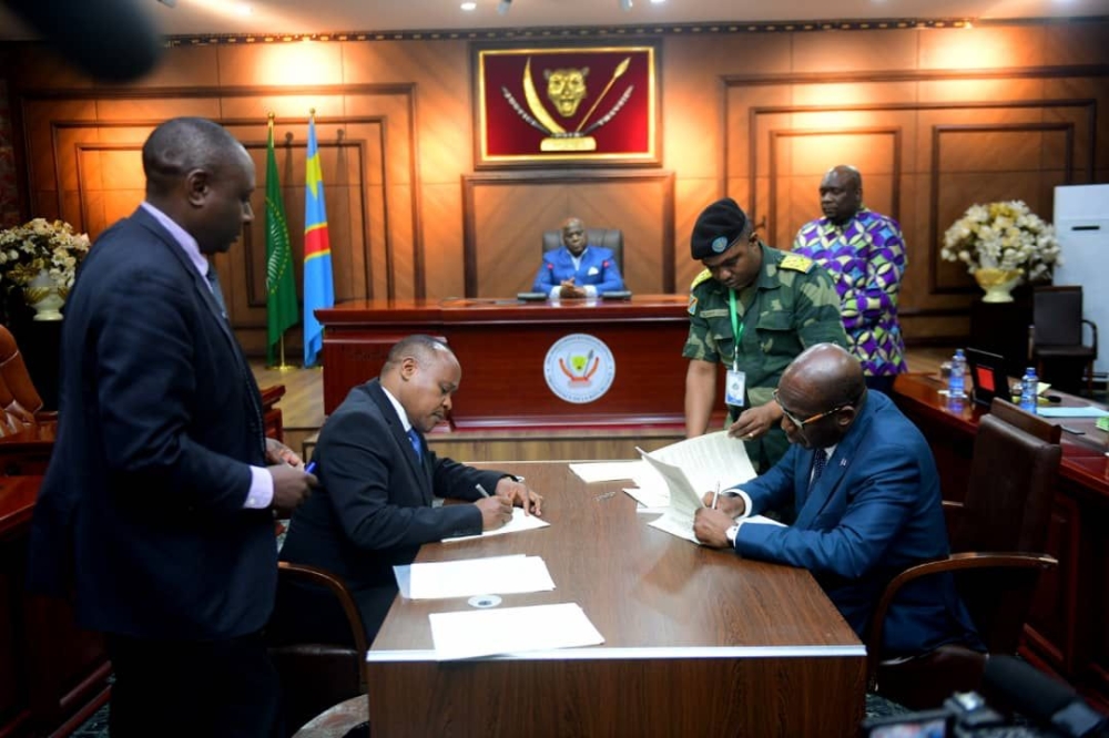 President Félix Antoine Tshisekedi graced the signing ceremony between   EAC Secretary General Peter Mathuki and DR Congo Vice Prime Minister and Minister of Foreign Affairs, Christophe Lutundula Apala Pen´ Apala  on  the Status of Forces Agreement (SOFA) at the official residence of the President in Kinshasa on September 9. Courtesy