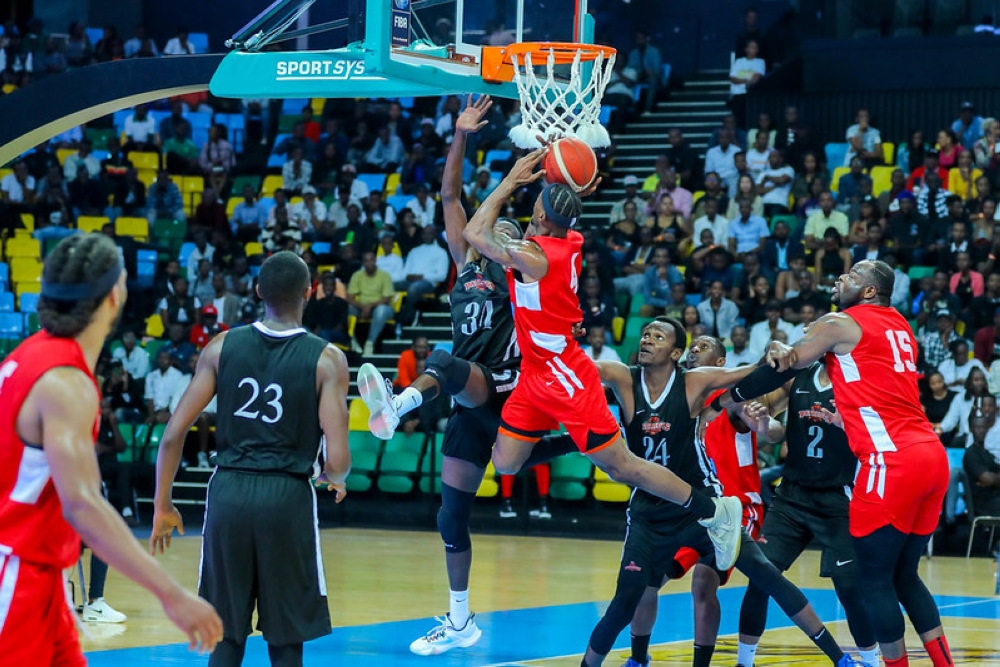 REG BBC and Patriots players vie for the ball during the 79-70 in game 2 on Saturday night. All photos by Dan Nsengiyumva
