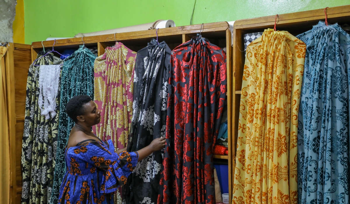 Brigitte Mukantaganda, 39, who has been part of the fashion house since 2003, seen here in her shop. / Dan Nsengiyumva