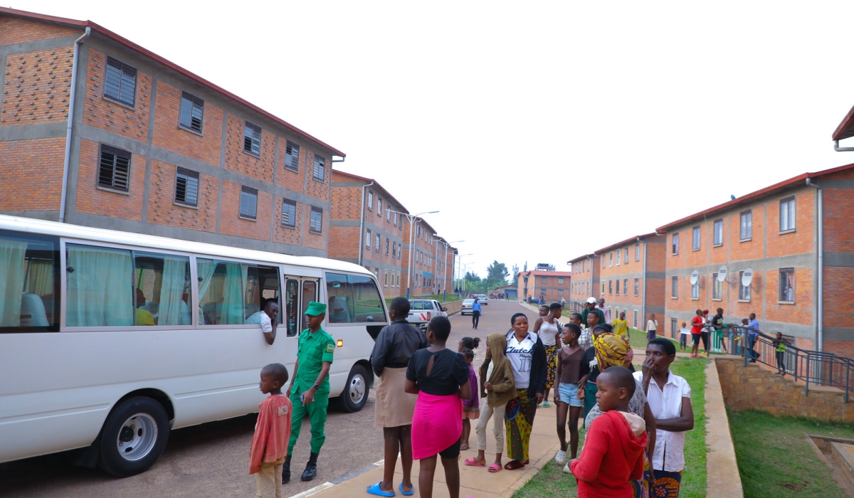 Families from Kangondo arrive at  Busanza Estate on Tuesday, September 13.The Estate in Kicukiro District  accommodate former residents of Kangondo.Photos by Dan Gatsinzi Kwizera