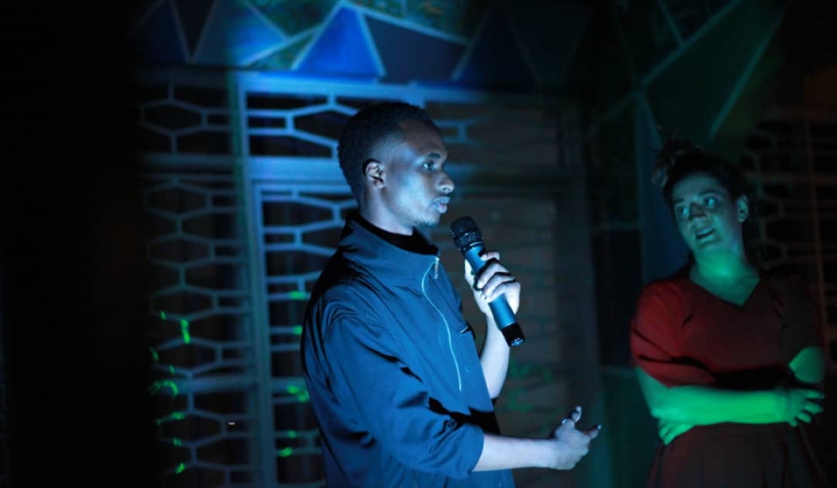 Henry Munyaneza  speaking during the exhibition