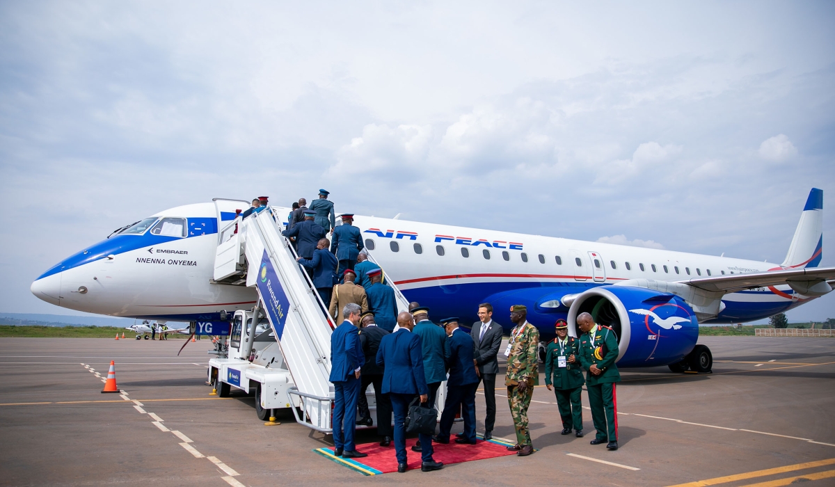 Delegates during a guide tour of Embraer&#039;s latest E195-E2 aircraft that was displayed at Kigali International Airport. This aircraft is the latest generation of technology that the world has to offer. It has high bypass ratio engines. / Photos: Olivier Mugwiza