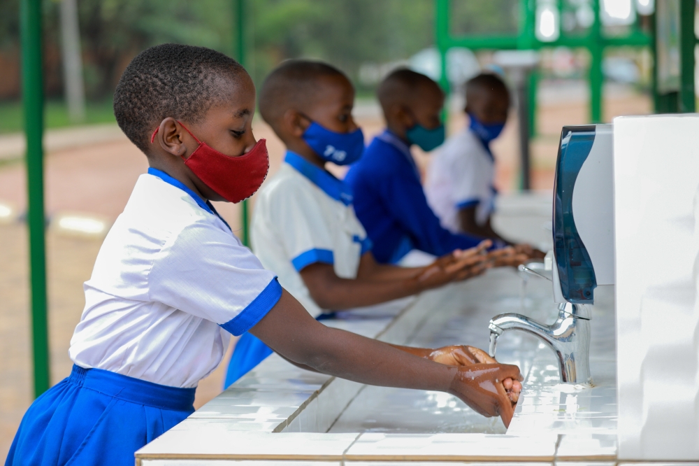 School children wash their hands to prevent the spread of Covid-19 at Groupe Scolaire Kicukiro on January 13, 2021.
According to the Ministry of Health, over two million children under 11 will get Covid jabs. Photo: Dan Nsengiyumva.