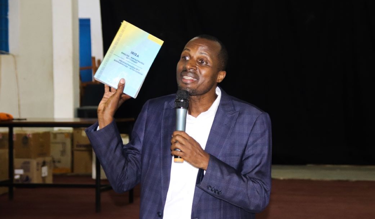 Emmanuel Habumuremyi who launched his first bi-directional dictionary (English-Kinyarwanda and Kinyarwanda-English) dubbed ‘Iriza Dictionary’. / Courtesy
