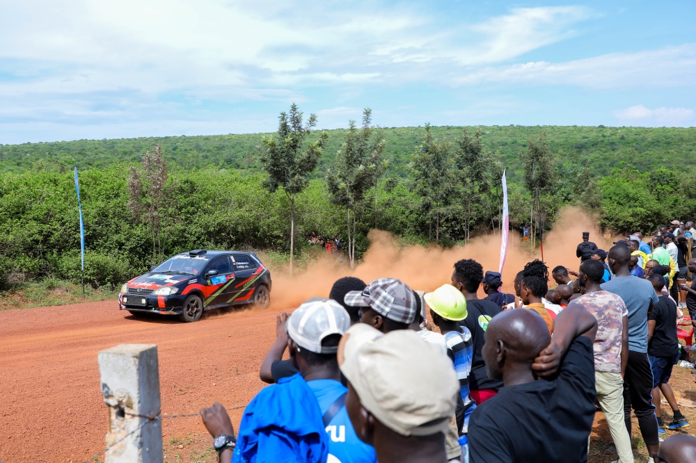 Tens of fans watch the race in the dusty roads of Nemba, Kamabuye and Gako in Bugesera 