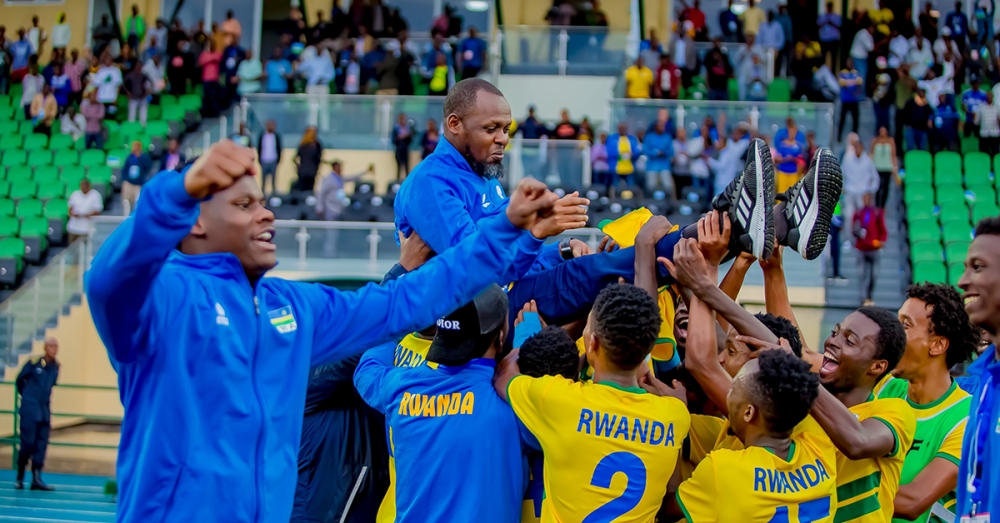 U23 National team lift up their Head coach Yves Rwasamanzi after beating 3-0  at Huye stadium. Courtesy