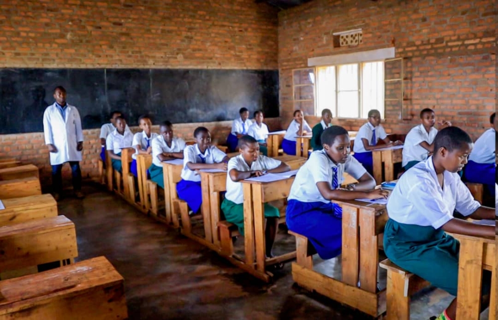 Candidates sit  the National Examination at Group Scolaire Shyorongi on July 26. A total of 21,186 primary pupils and 18,369 Ordinary Level candidates, who sat their national exams last year, are set to repeat the exams .Courtesy