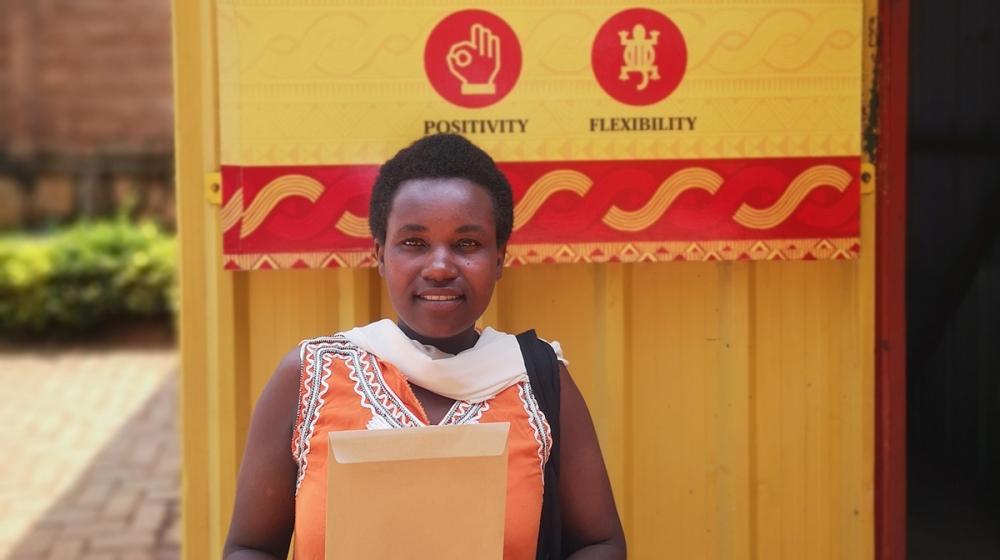 Christine Nyiransengimana is thankful to the Mr. Ivan, SKOL’s CEO for having kept his word and allowed her son to attend school.Courtesy