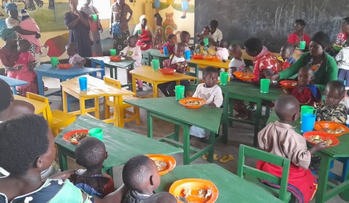 Children eat porridge at Mbazi Early Childhood Development centre in Nyamagabe District. / All photos: Courtesy