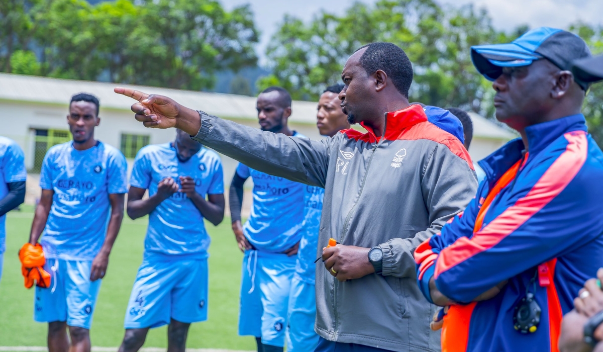 Police FC coach Vincent Mashami (center) talks to his players during a recent training session. The 40-year-old former Amavubi coach is under intense pressure after failing to pick up a win in the last three matches of the league season. Photo: Courtesy.