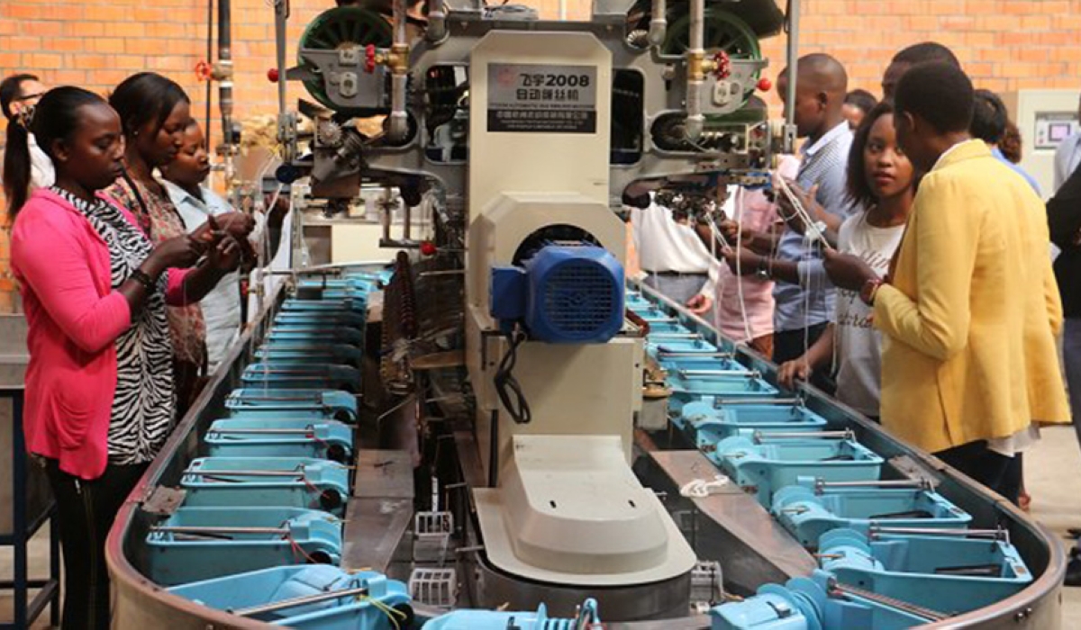 Workers reel silk filaments at the Kigali Silk Factory located in Kigali Special Economic Zone. / Courtesy photo