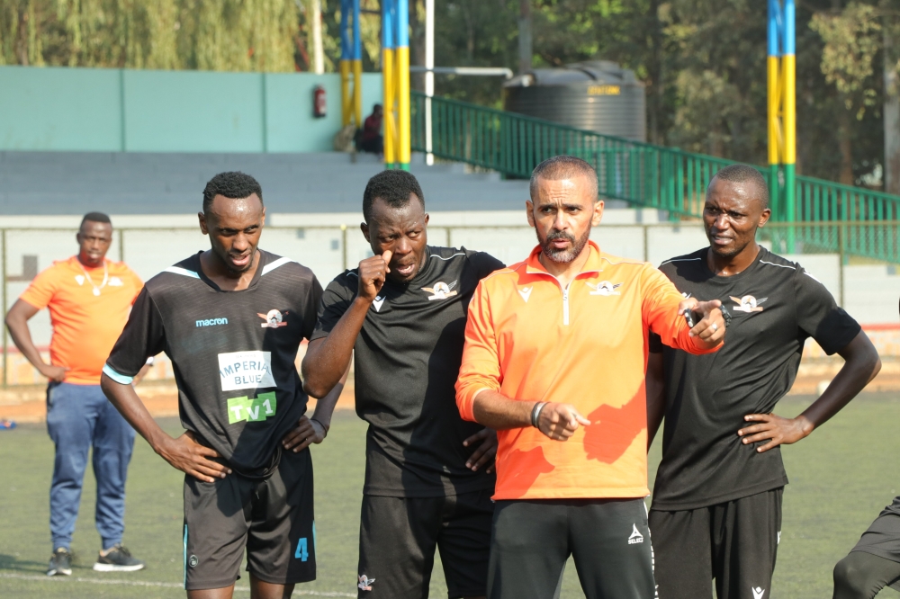 Gasogi coach Ahmed Adel talks to the club’s players during a training session. The Egyptian coach has appealed the CAF ban that was imposed on him recently. Photo: Courtesy.