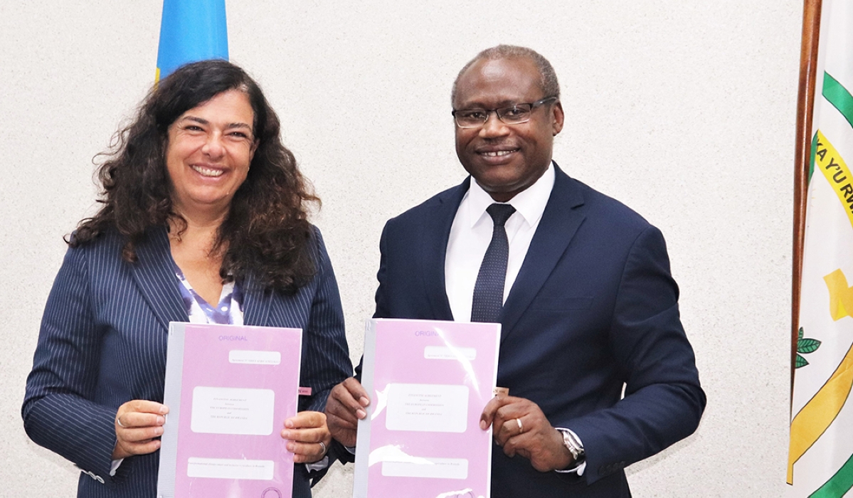 Uzziel Ndagijimana, Minister of Finance and Economic Planning and Belen Calvo Uyarra, EU designate Ambassador to Rwanda after signing the agreement in Kigali on Thursday ,October 6. Courtesy