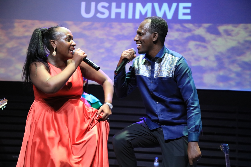 Husband-and-wife duo Ben Serugo and Chance  Mbanza Juru during the perormance, 