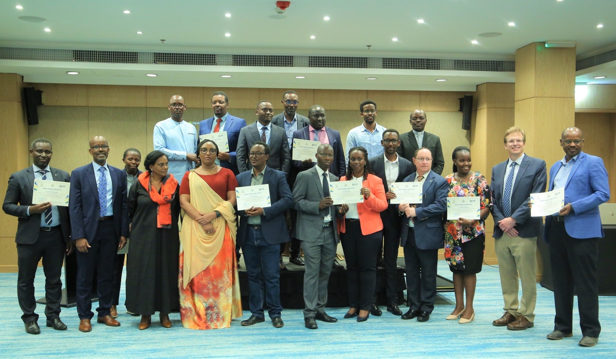 Officials in a group photo with the winners of fifteen projects related to Science, Technology And Innovation who were awarded on October 7. / All photos by Craish Bahizi