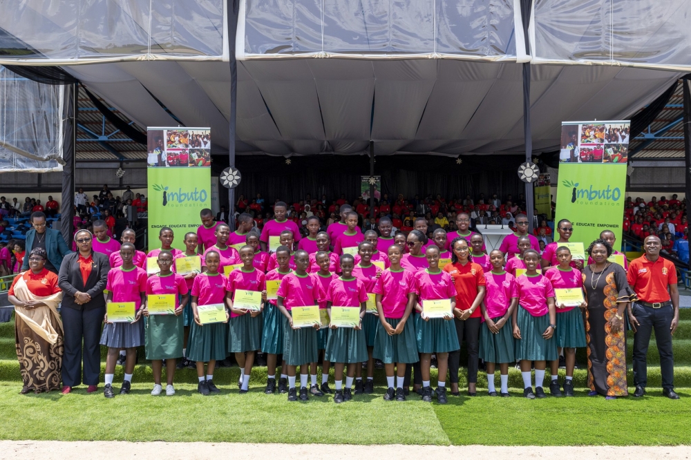 First Lady Jeannette Kagame in a group photo with some of the 784 best performing school girls who were awarded during the event in Musanze. / Photos: Imbuto Foundation
