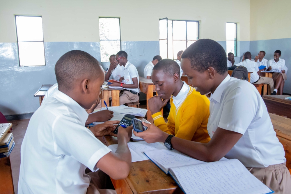 Students during a group work at College St Andre in Nyamirambo. The school  is in the process of requesting a green light from the ministry to restore the previous school fees of Rwf 176, 000. Photo: Craish Bahizi.
