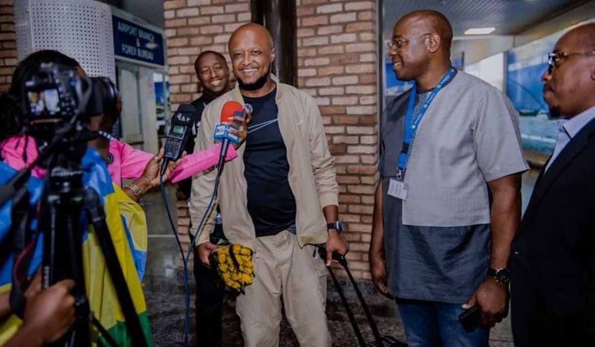 Rwandan football legend Jimmy Gatete arrives at Kigali International Airport on October 11. / Courtesy