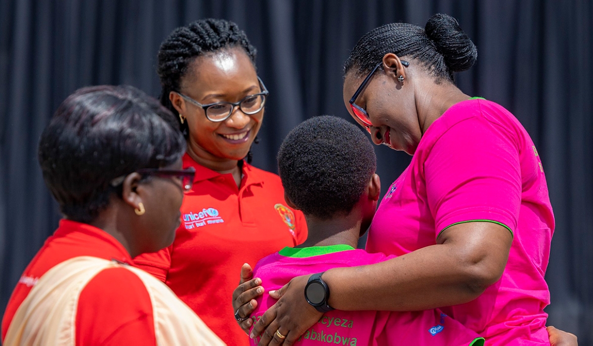 First Lady Jeannette Kagame awards one of the 784 best performing school girls  during the celebration of the  10th anniversary of the International Day of the Girl, in Musanze District  October 11. Courtesy
