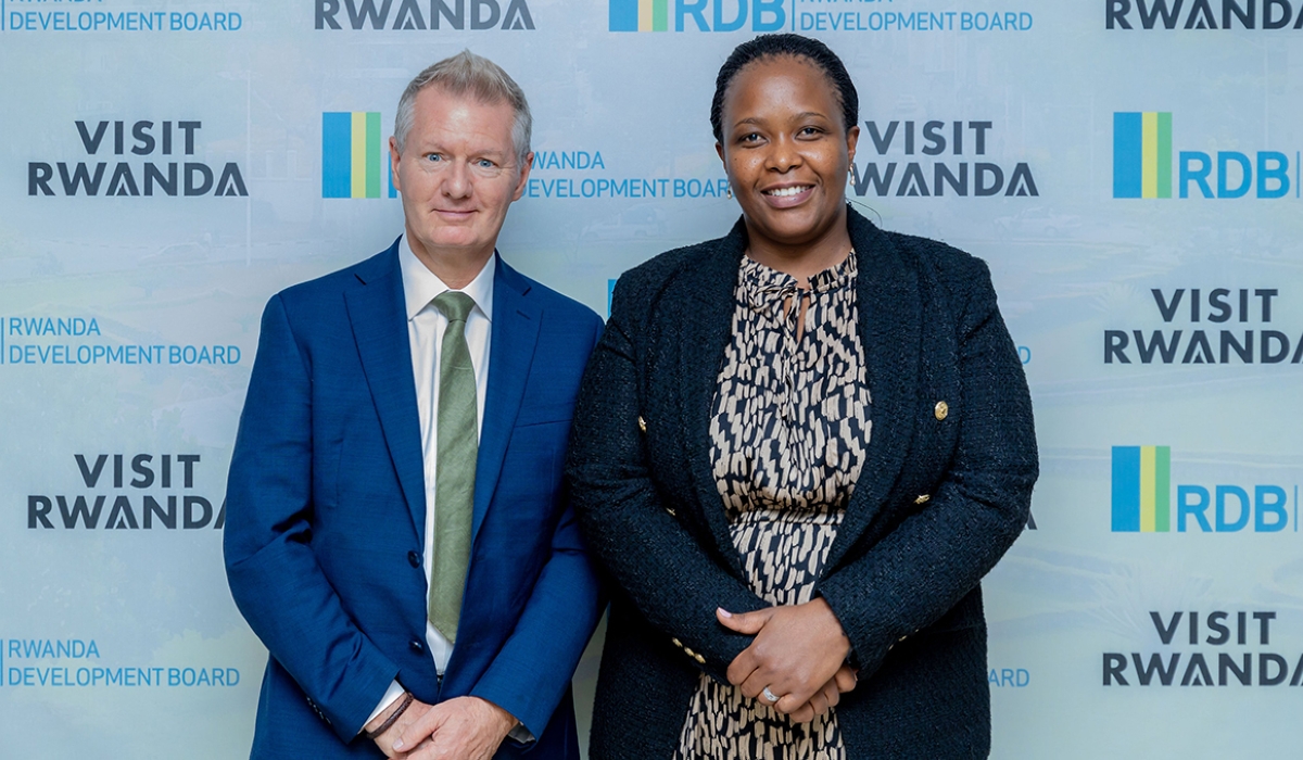 Stephen Colvin, Chief Commercial Officer, Bloomberg Media. and  Clare Akamanzi, the Chief Executive Officer at the Rwanda Development Board  pose for a photo in Kigali, on October 11. Courtesy