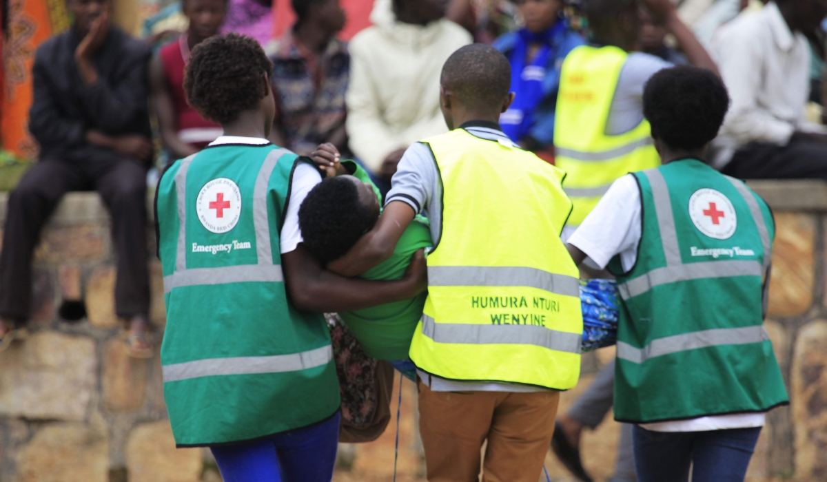 Volunteers carry a trauma victim during a commemoration event at Murambi Genocide Memorial. Activists have called for improved service delivery in public hospitals that offer mental health services. Photo: File.