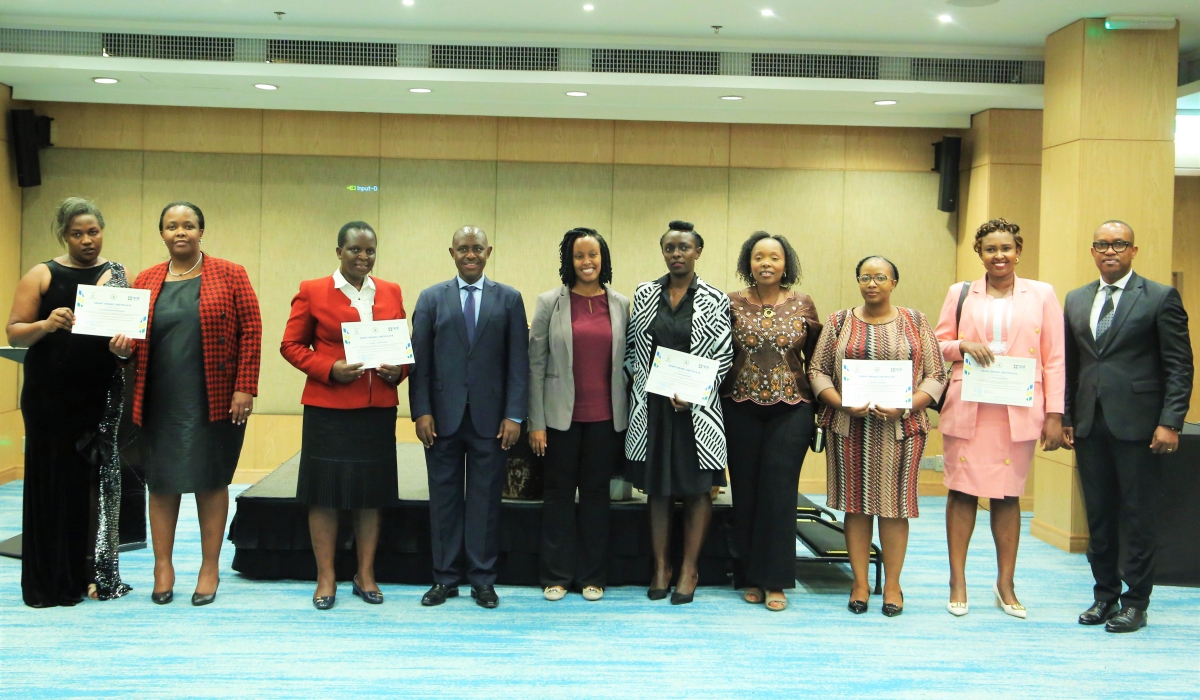 Winners in a group photo with officials, each project secures $90,000. / Craish Bahizi