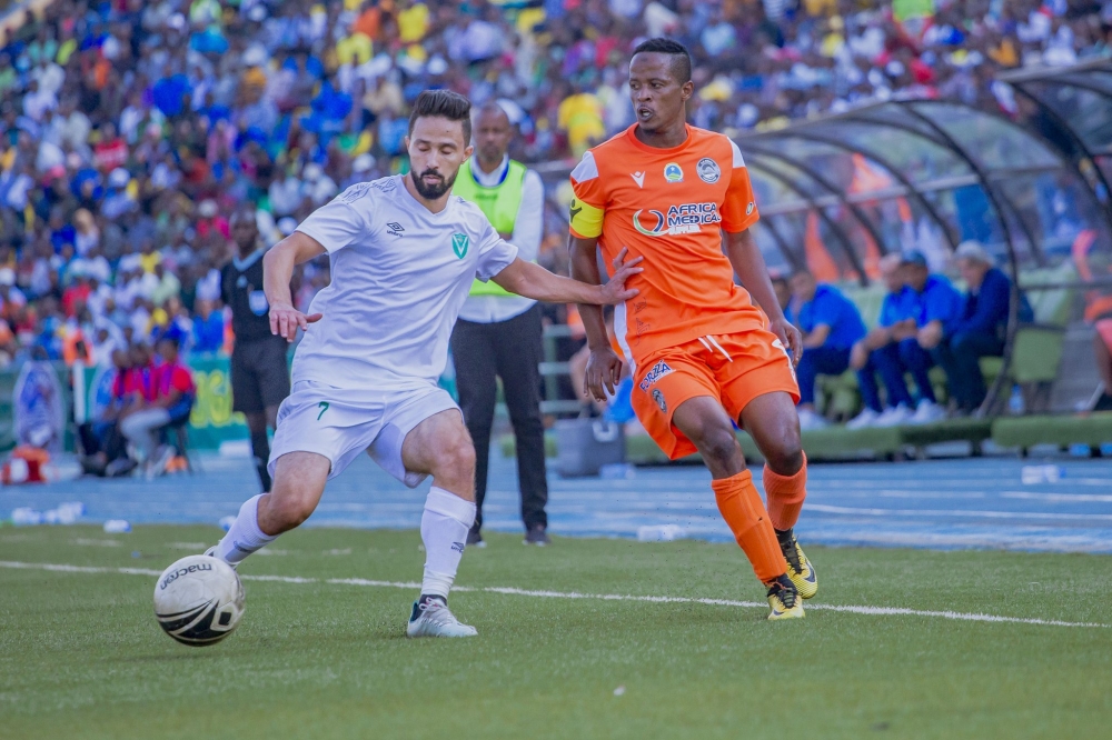 Al Nasr&#039;s player controls the ball against AS Kigali &#039;s Forward Haruna Niyonzima, the skipper of the team during a goalless draw at Huye stadium. Haruna said that he has faith in his squad ahead of the match. COURTESY