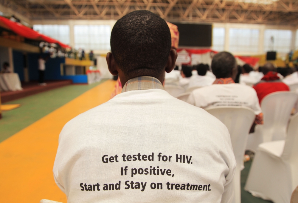 A particiapant wears a  t-shirt with a message on the World AIDS Day. RBC is using schools, youth centres and media to inform youth as well as the public that HIVAIDS is still an epidemic. File