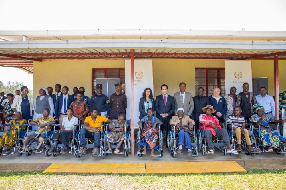 Some of the people with disabilities who benefit from a donation of 200 wheelchairs from the United Arabs Emirates embassy in Rwanda, during the handover  on October 13. Courtesy