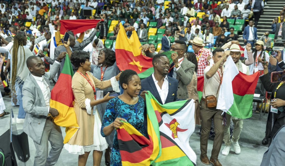 Delegates from different countries with their national flags  at  the Youth Connekt Summit in Kigali on Thursday, on October 13. Photo by Village Urugwiro