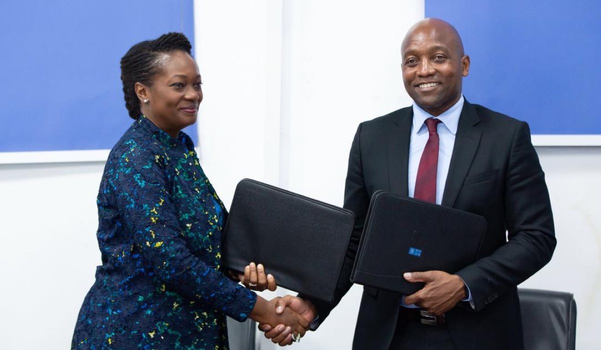 Chief Executive Officer of TEF foundation, Ifeyinwa Ugochukwu and Maxwell Gomera, UNDP Resident Representative after signing  a funding agreement on October13. Courtesy