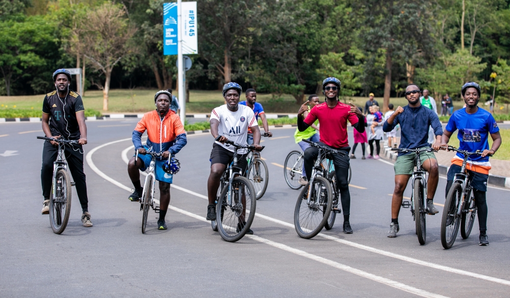 Cyclists pose for a photo during the bimonthly Car Free Day mass sports in Kigali on October 16. Olivier Mugwiza
