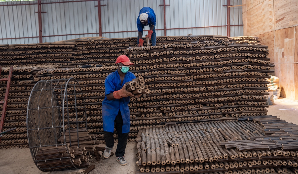 Workers in a youth owned factory that produces environment friendly briquettes. Photo: Willy Mucyo.