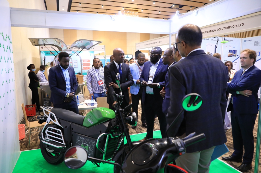Ernest Nsabimana, the Minister for infrastructure during a guided tour of the exhibition atthe Global Off-Grid Solar Forum & Expo 2022 in Kigali from October 18. Photos by Craish BAHIZI